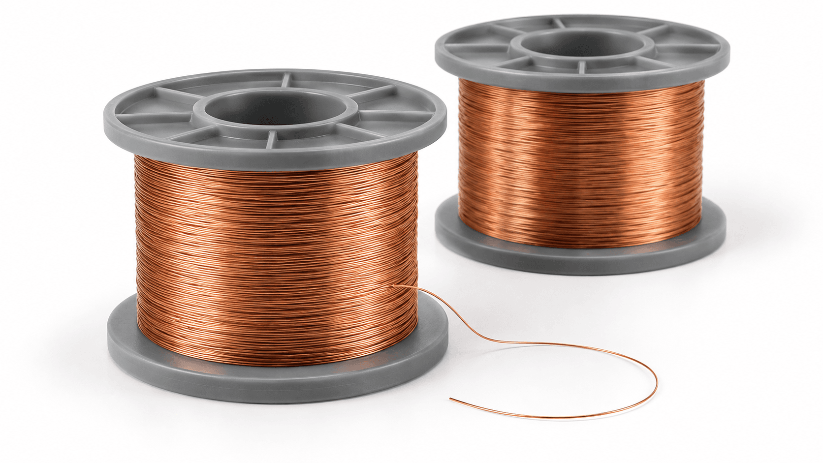 Fine bare copper wire on a reel with one wire end extended
